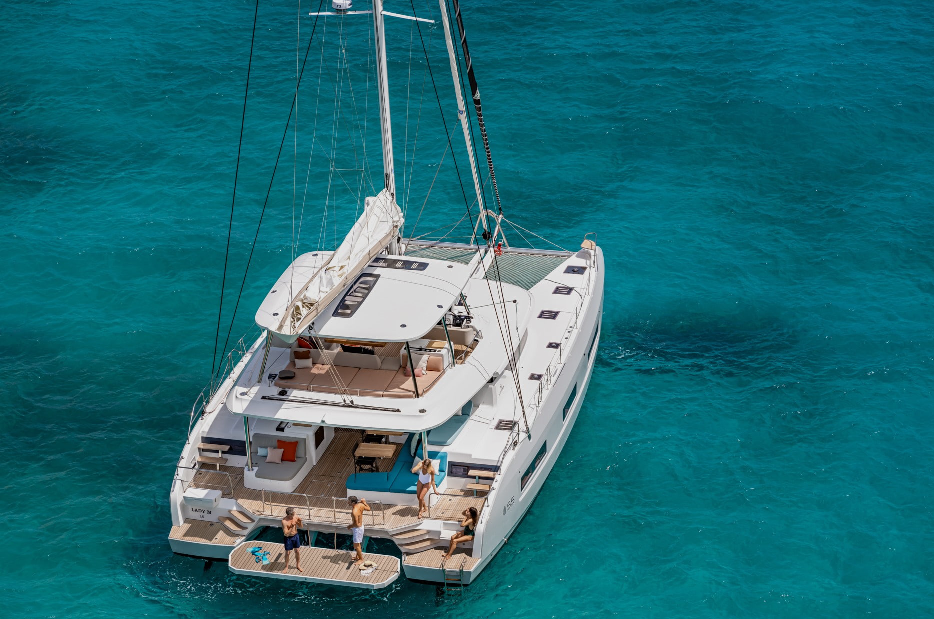 Catamaran with a red sail